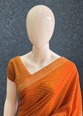 Self Orange Pure Banarasi Crepe Silk Saree