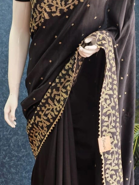 Self  Black Raw Silk Saree