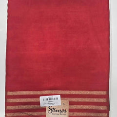 Contrast Orange Bottle Green Crepe Silk Saree