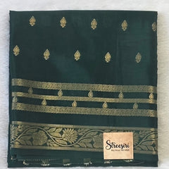 Self  Bottle Green Semi Crepe Silk Saree